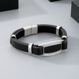 Detailed shot of double-layer leather bracelet with crystal encrusted stainless steel bar