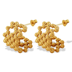 18K gold plated mesh C-shaped bead stud earrings with hollow spherical design on white