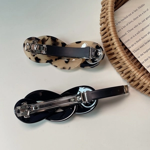 French vintage twist hair clips in tortoiseshell and black acetate for women
