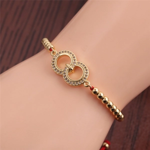 Detail of red woven adjustable bracelet with interlocking micro-pave zircon rings