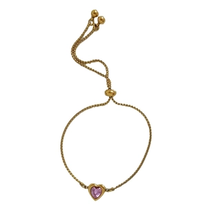 Adjustable gold stainless steel bracelet featuring a heart-shaped pink zircon stone