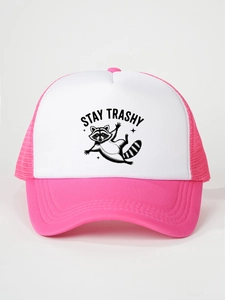 Detail of pink trucker hat featuring cartoon raccoon and Stay Trashy print on white panel