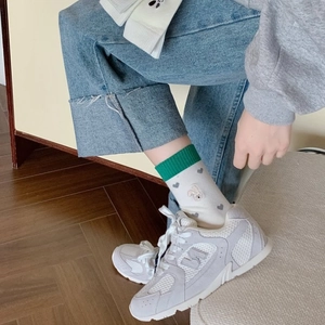 Women's cotton crew socks featuring cute rabbit embroidery and green ribbed cuffs