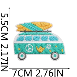 Close-up of embroidered van patch with surfboard and size measurements in cm and inches