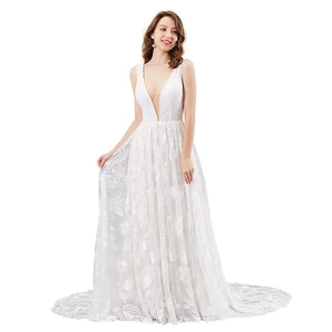 Elegant white deep V-neck bridal gown with floral lace embroidery and sleeveless design