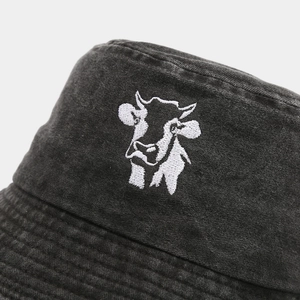 Retro washed black cotton bucket hat with cow embroidery and quilted brim details