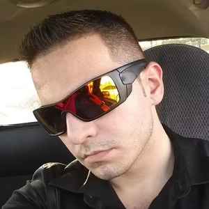 Men's Y2K futuristic sports sunglasses with red mirrored lenses in a tactical black frame