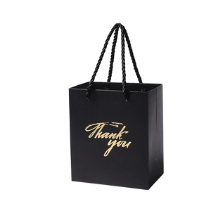Elegant black gift bag with gold Thank You script and premium braided handles