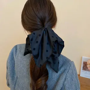 Molla per capelli vintage francese a pois neri con elegante fiocco di raso