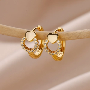 Elegant 18K gold plated heart hoop earrings with cubic zirconia on display stand