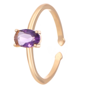 Vintage gold open ring featuring a purple oval zircon in a secure four-prong setting