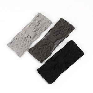 Detailed knit texture of thick bow headbands in grey, dark grey and black colors