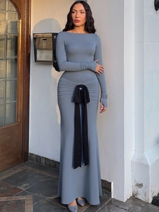 Elegant grey-blue long-sleeve maxi dress with ruched waist and black bow tie design