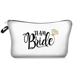 White canvas TEAM Bride makeup bag with gold ring print and black handle for weddings