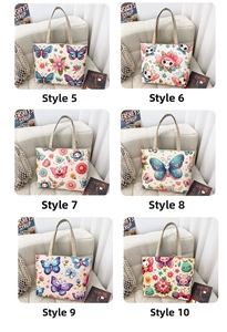 Macro view of canvas tote bags with various ethnic floral and butterfly prints