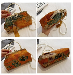 Detailed views of vintage orange brocade shell bag with floral embroidery and pearl chain