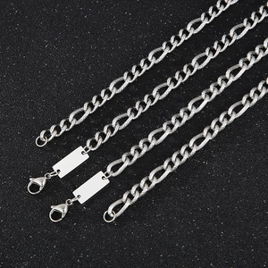 Detailed macro view of silver titanium steel chains with blank rectangular pendant tags