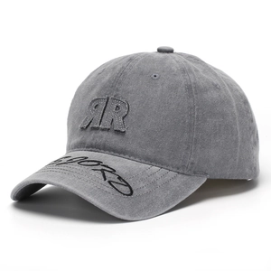 Close-up of gray washed cotton baseball cap with RR embroidery and Sport stitching details