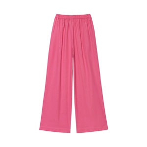 Détail du pantalon large en lin rose doté d'une taille élastique confortable