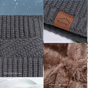 Winter thermal knit hat with thick fleece lining and mountain logo leather patch
