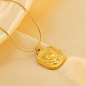 Vintage gold square coin necklace with warrior relief on a delicate snake chain