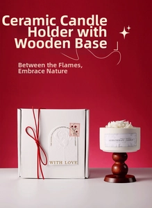 Detailed aromatherapy candle set with ceramic cup, wooden base and red ribbon gift box