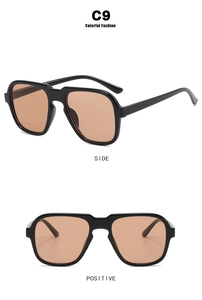 Detail view of large black frame pilot sunglasses model C9 with light brown lenses