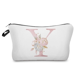 Close-up of pink floral letter 'Y' printed on a white minimalist canvas makeup bag