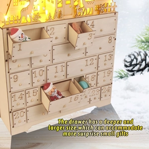 Close-up of laser-cut reindeer scene and 24 storage drawers on wood advent calendar
