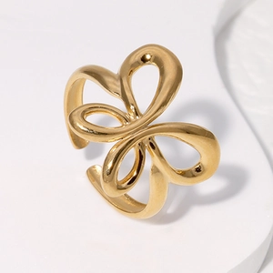 Minimalist gold butterfly open ring made of durable stainless steel on a white platform