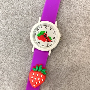 Kids purple silicone watch with 3D strawberry charm and cartoon quartz dial design