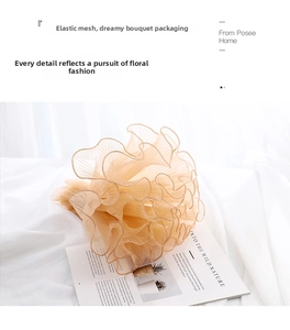 Detail of soft pink pearl wave pleated mesh fabric for DIY flower bouquet wrapping