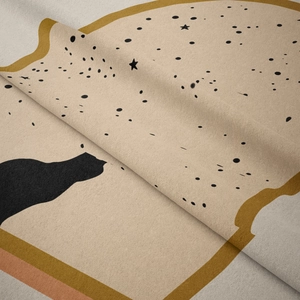 Close-up of bohemian plush tapestry showing detailed soft fabric texture and cat pattern
