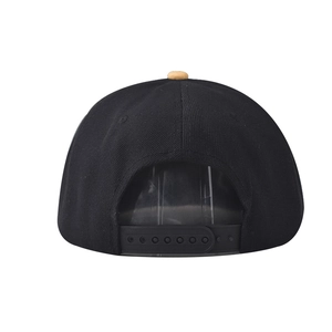 Close-up of the adjustable black snapback closure on a cotton twill baseball cap