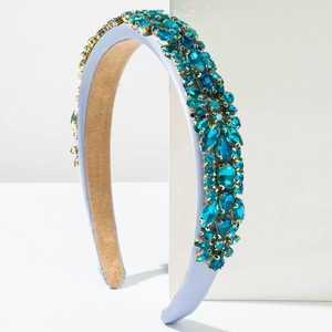 Serre-tête de luxe en éponge avec cristaux bleus et strass baroques sur base dorée