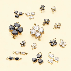 Exquisite gold stainless steel clover and bow charms with black and white zircon stones