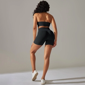 Rear view of seamless ribbed sports set with high-waisted shorts and crop top