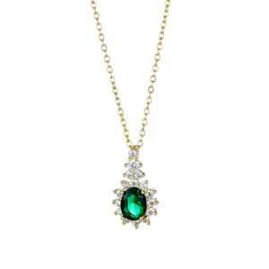 Golden necklace with emerald oval pendant and diamond halo on white background