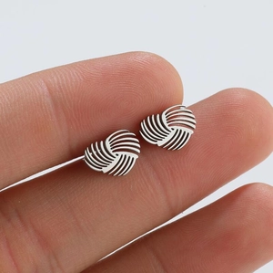 Minimalist silver round stud earrings with spiral textured relief for women