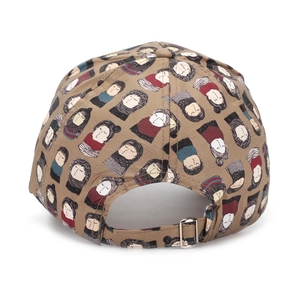 Detailed back view of tan baseball cap with cartoon print and adjustable metal buckle