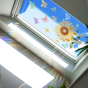Rainbow prism sunflower and butterfly static window decals reflecting light on wall