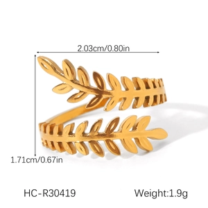 Detailed view of leaf-shaped gold open ring with dimensions and weight specifications