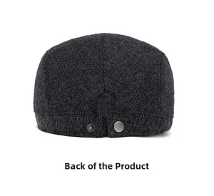 Detail view of the charcoal wool blend hat back featuring a secure metal snap button closure
