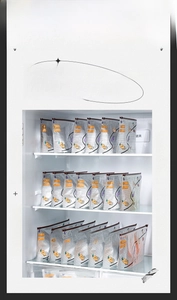 Aluminum foil freshness bags with silver ions storing vegetables in a refrigerator shelf
