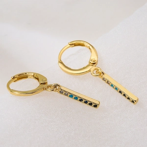 18K gold plated earrings featuring geometric pendants with blue and black cubic zirconia