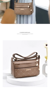 Detailed view of khaki quilted PU leather bag featuring elegant heart stitching and metal logo