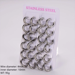 Detail of 4mm thick stainless steel hoop earrings set with 12 pairs in silver finish