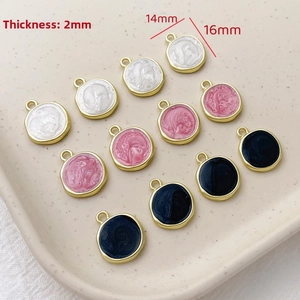Detail of 2mm thick enamel disc charms in 14mm and 16mm sizes for DIY jewelry making