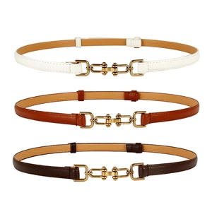 Three adjustable leather belts in white and brown with interlocking gold metal buckles