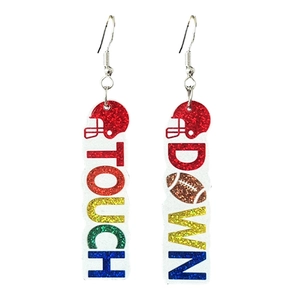 Close-up of glittery football earrings with Touch Down lettering and helmet design